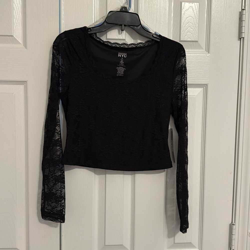 Black lace top, sheer sleeves. Crop.